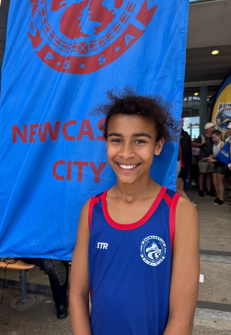 A Year 6 girl wearing her Primary School Sport ASsociation uniform at at the Newcastle City championships